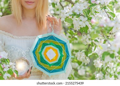  Woman with mandala and magic ball. Energy reiki concept, clean from negative energy