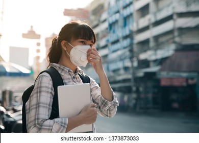 Woman With A Mask Because Of Air Pollution In The City