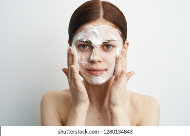 Woman Massages Healthy Skin Face