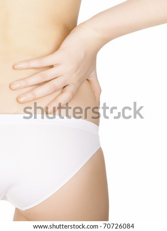 Woman massaging pain back, isolated over a white background