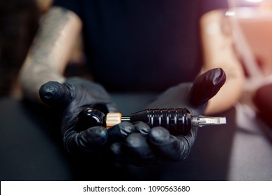 Woman Master Arm Holding Tattoo Machine, Preparing For Drawing Picture