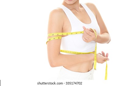 Woman measuring upper arm