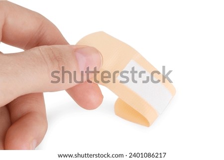 Woman with medical adhesive bandage isolated on white, closeup