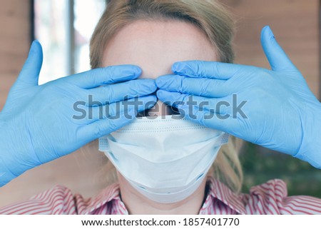 woman in medical mask and gloves. symptoms of coronavirus. world pandemic. girl in protective mask at home. stay home