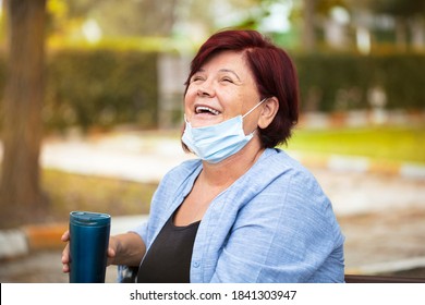 Woman In Medical Mask Outdoors New Normal Social Concept
