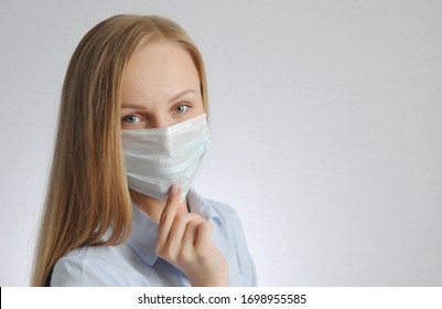 woman with medical mask. portrait of blonde girl. virus and health protection poster concept - Powered by Shutterstock