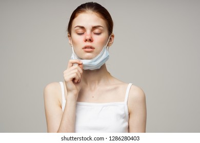 A Woman With A Medical Mask Red Nose Health Problems Runny Nose            