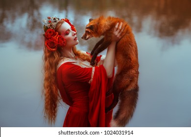Woman in medieval clothes with a fox
