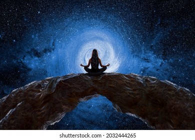 Woman meditating and observing the universe - Shutterstock ID 2032444265