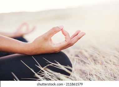 Woman Meditating Practicing Yoga Outdoors