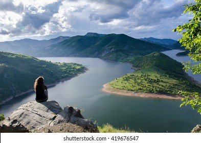 woman meditating relaxing alone Travel healthy Lifestyle concept lake and mountains sunny landscape on background outdoor