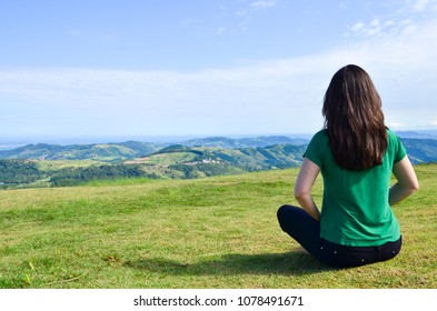 Woman Meditation On Top Of Montain