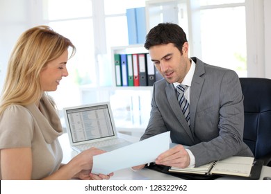 Woman Meeting Banker To Set Up Her Own Business