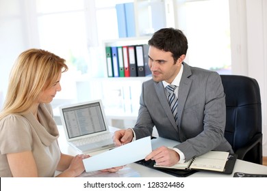 Woman Meeting Banker To Set Up Her Own Business