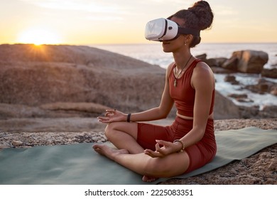 Woman, metaverse or vr headset in yoga meditation by beach, ocean waves, sea water in mental health support, zen app or 3d peace ai. Lotus, relax or wellness person on virtual reality chakra software - Powered by Shutterstock