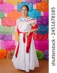 Woman in Mexican folk attire against a festive background