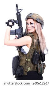 Woman in a military camouflage holding the assault rifle isolated over white background