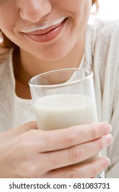 Woman With A Milk Moustache