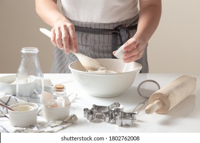 Woman Mixing Dough For Cookies