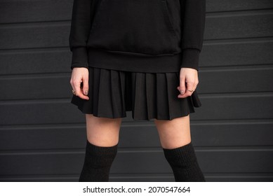 Woman Model No Face In Black Dress And Black Sweatshirt Posing On Black Background 