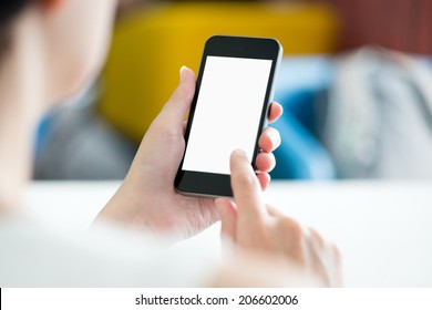 Woman With Modern Mobile Phone In Hands Touching On A Blank Screen. Blurred Office Interior On A Background.