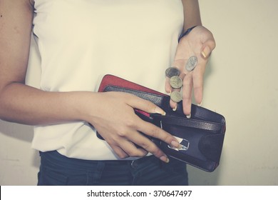 Woman Money Into The Wallet