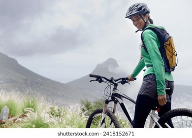 Woman, mountain bike and portrait in nature, adventure and helmet for safety, fitness and mock up space. Girl, bicycle and ready for training, race and outdoor challenge in countryside in Cape Town - Powered by Shutterstock