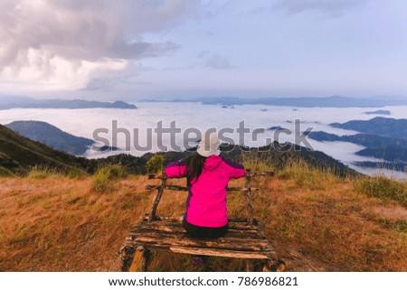 woman Mountains in with clouds travel Lifestyle A backpacking trip 
