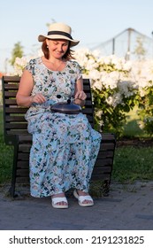 Woman Musician Playing Steel Tongue Drum,music And Gluckophone Instrument.