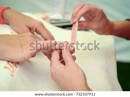 woman nail manicure in salon