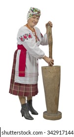 Woman in national historic Russian peasant costume with historical utensils