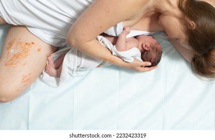 Woman with new born baby have a rest - Shutterstock ID 2232423319