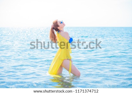 Similar – Surfer woman and yellow surfboard-France