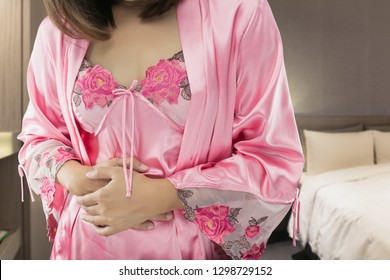 The Woman In Nightwear Wake Up For Go To Bedroom, Women With Menstrual Disorders At Night, Menstrual Cramps, Irritable Bowel Syndrome Or IBS