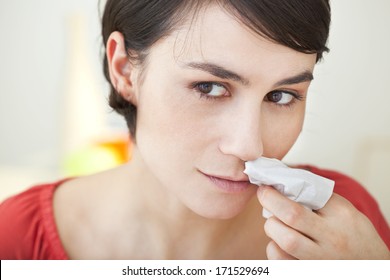 Woman With Nosebleed