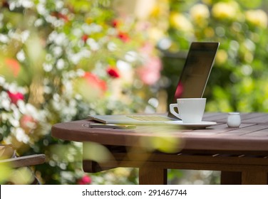 Woman With Notebook On The Garden, Working Outside.