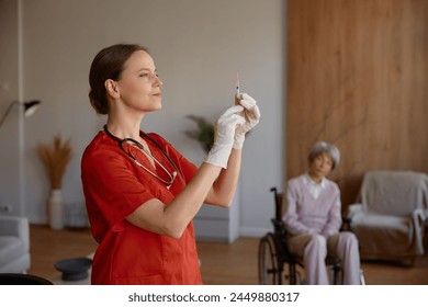 Woman nurse preparing syringe for vaccination of old lady patient - Powered by Shutterstock