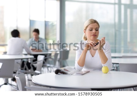 Similar – Woman filing nails in colored background