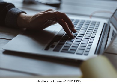 Woman In Office Using Laptop. Shallow Depth Of Field.