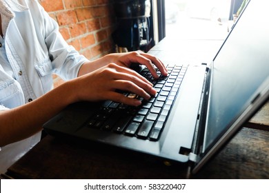 Woman office worker is typing keyboard, silhouette style, close up - Shutterstock ID 583220407