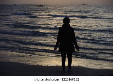 Woman On Beach In Early Morning Sun On Lido Beach In Venice 