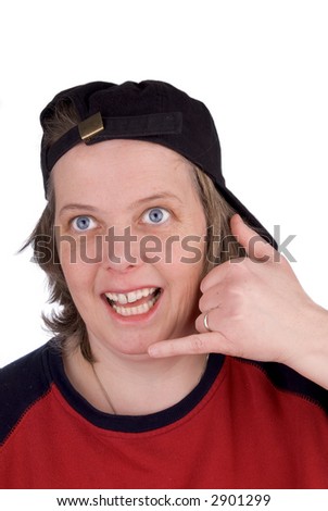 Woman on a comedy hand phone with baseball hat and t-shirt, over white