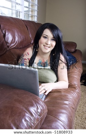 Woman on the Couch with her Laptop