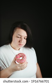 Woman On Diet Can't Resist Craving To Eat Tasty Sweet Doughnut. Food Addiction, Diet Breakdown, Compulsive Overeating Concept