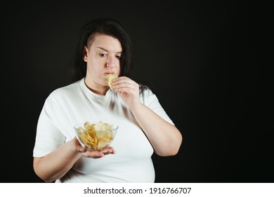 Woman On Diet Can't Resist Craving To Eat Potato Chips. Food Addiction, Diet Breakdown, Compulsive Overeating Concept