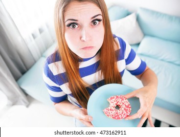 Woman On Diet Caught During Eating Unhealthy Donut