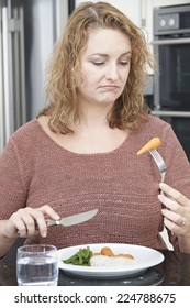 Woman On Diet Fed Up With Eating Healthy Meal 