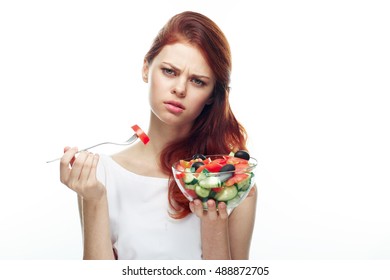 Woman On A Diet. Strict Diet. Salad. Dissatisfaction With Food