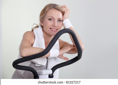 Woman On Exercise Machine