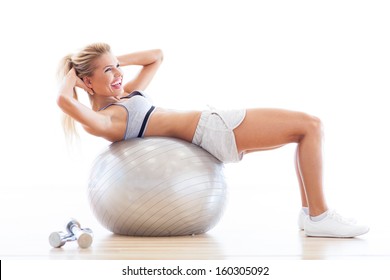 Woman on fitness ball  - Powered by Shutterstock